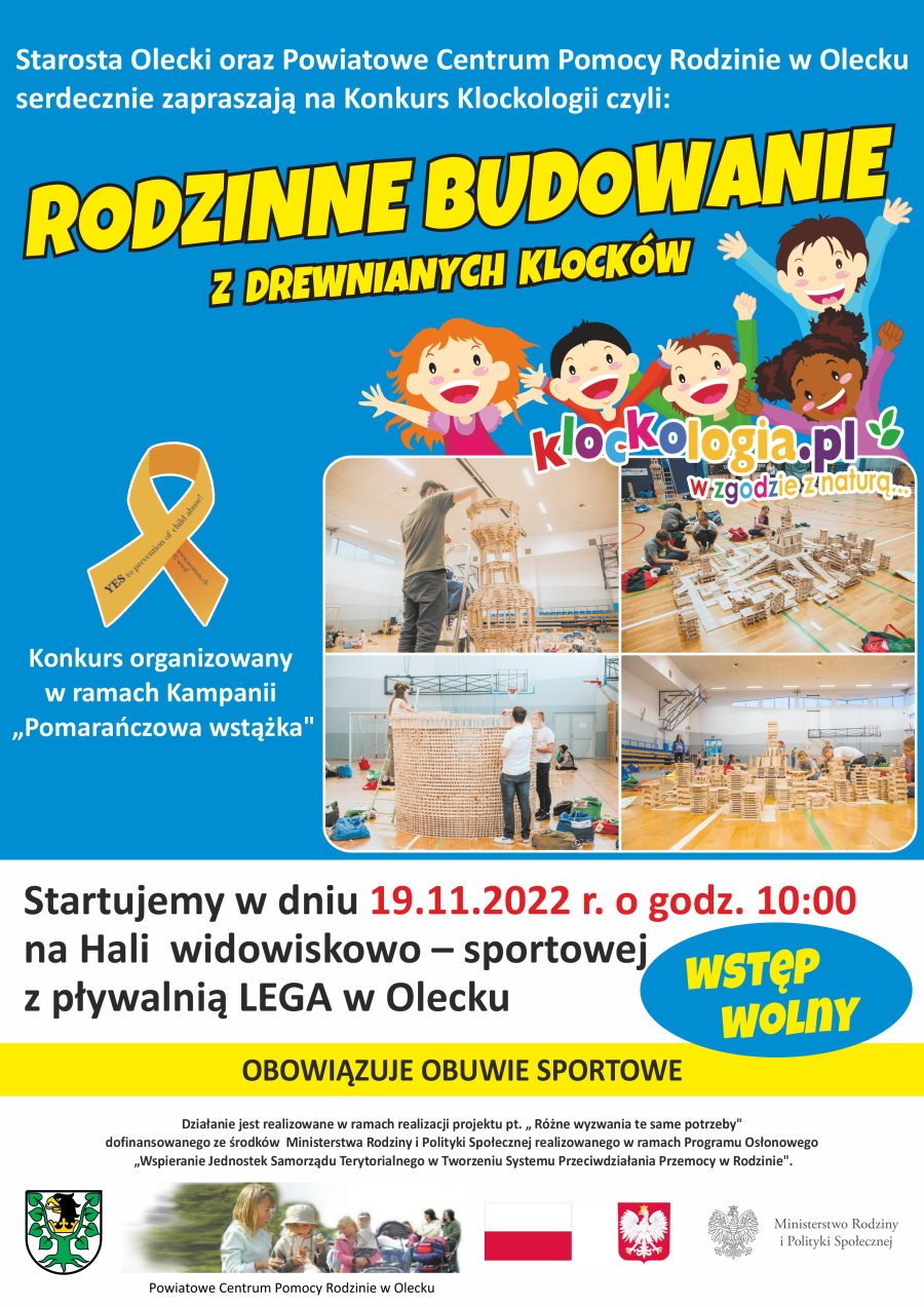 Grafika. Jest na niej zaproszenie na konkurs klockologii: rodzinne budowanie z drewnianych klocków. Startujemy 19.11.2022 r. o godz. 10:00 w Hali Lega w Olecku. Wstęp wolny. Obowiązuje obuwie sportowe. Konkurs jest organizowany w ramach Kampanii Pomarańczowej Wstążki. Na plakacie jest wstążka, dzieci i 4 zdjęcia, na których ludzie budują budowle z klocków. Na dole logotypy urzędów z informacją o współfinansowaniu.